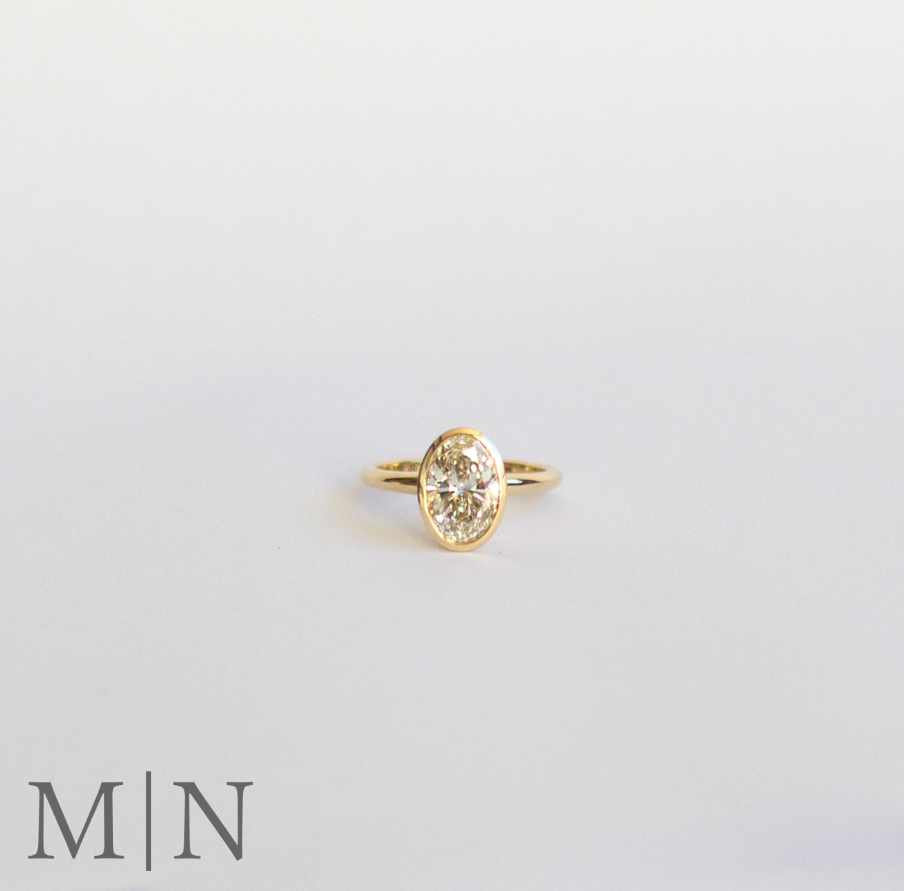 Yellow Gold Oval Diamond Solitaire Ring