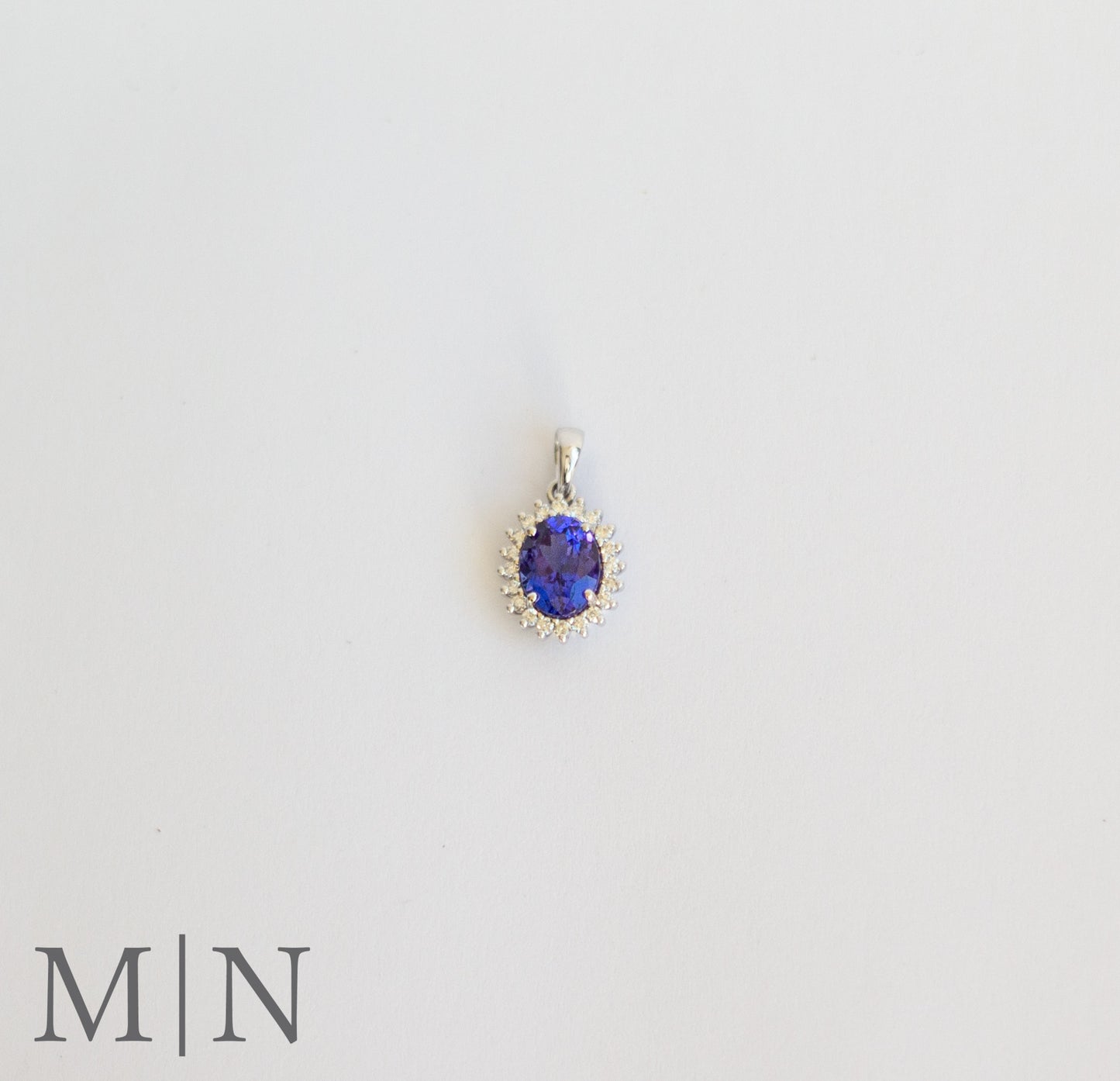 White Gold Tanzanite & Diamond Halo Pendant