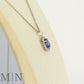 White Gold Tanzanite & Diamond Halo Pendant