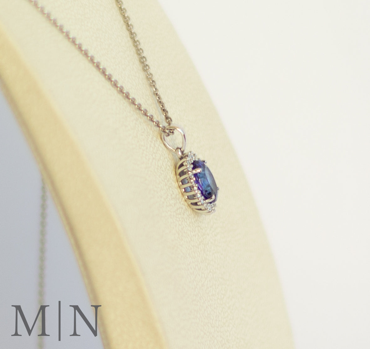 White Gold Tanzanite & Diamond Halo Pendant